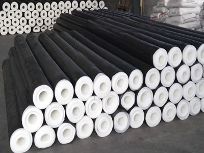 Numbers of ECB geomembrane are packed with black woven bags, and piled up together orderly in the factory.