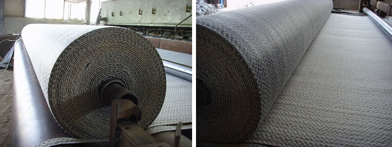 There is a roll of geosynthetic clay liner that is on the produce machine, we can see it from different views.