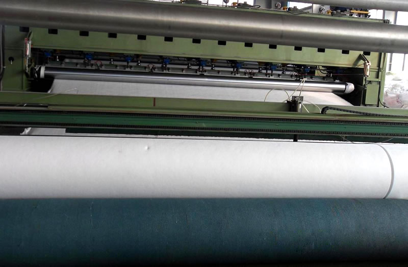 The machine that produces short fiber geotextile fabric.