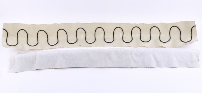 Two pieces of spring semicircle tube are lying on the white background, one is its frontage side, and the other one is its reverse side.